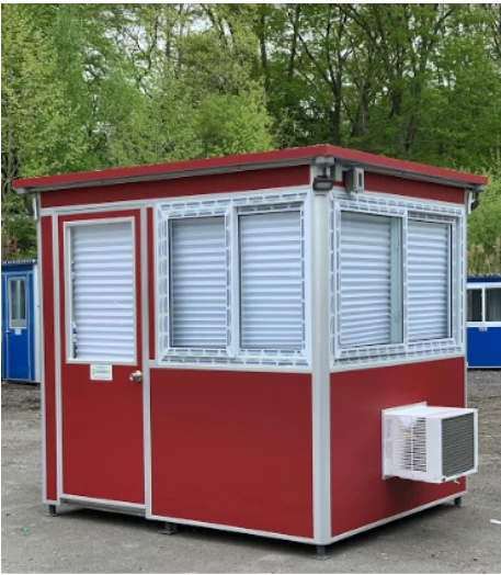 A red guard booth with closed blinds