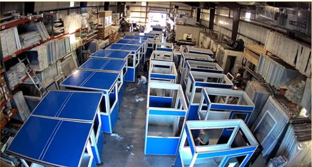 A warehouse full of prefabricated guard booths.
