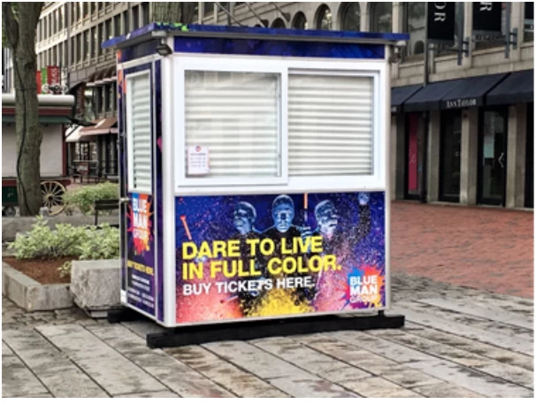 Blue Man Group booth with security shades drawn