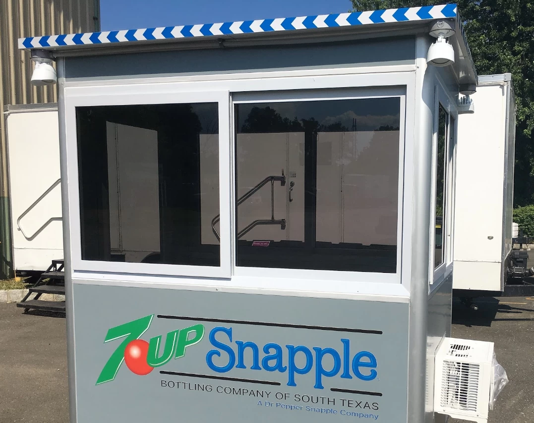 Custom designed guard booth with 7 Up and Snapple logos