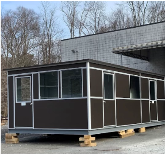 Large, brown, modular outdoor office building