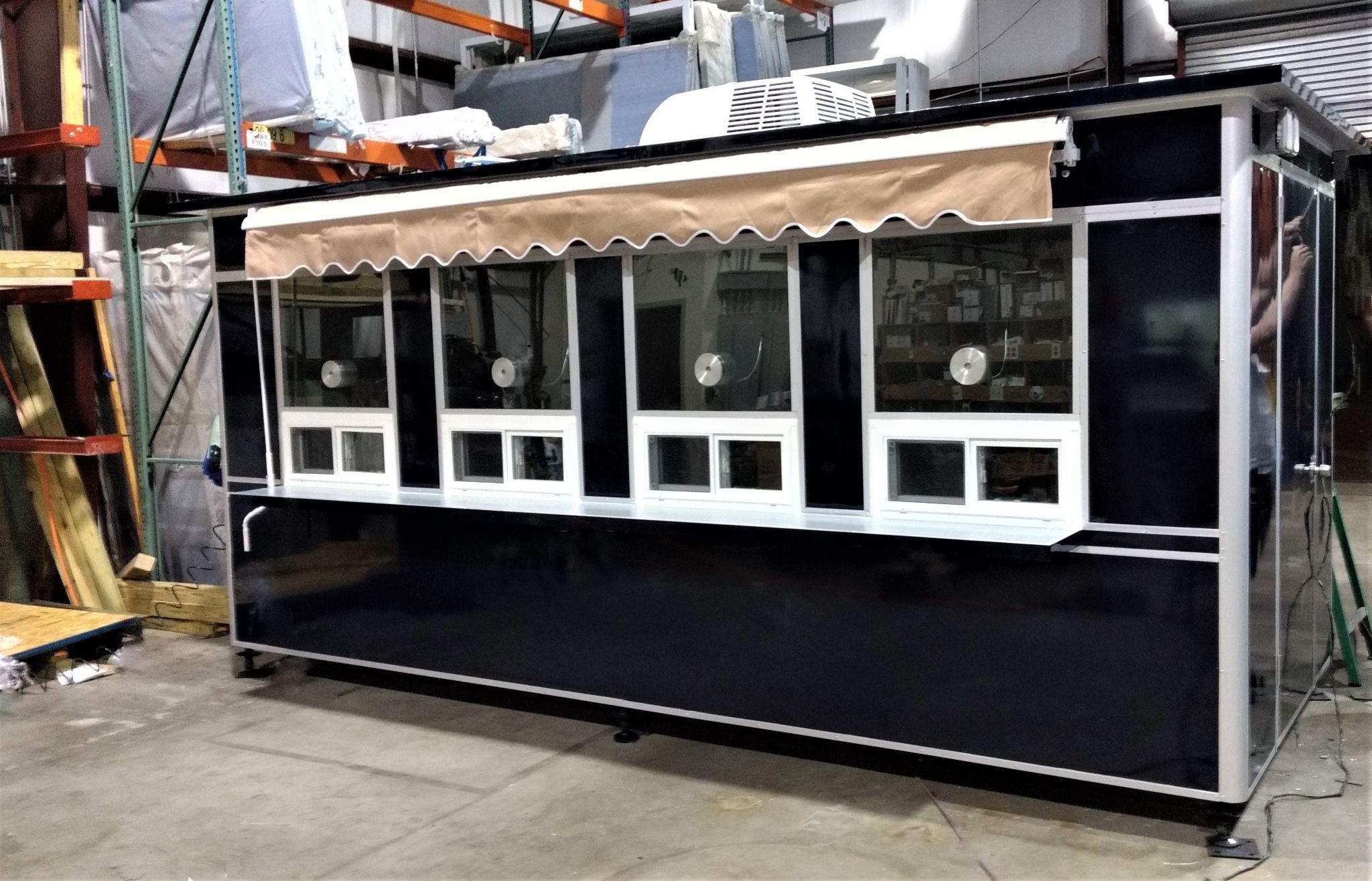 Outdoor customer service booth with awning