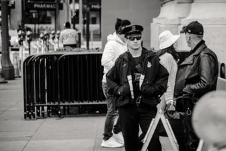 Security guards standing on the street 
