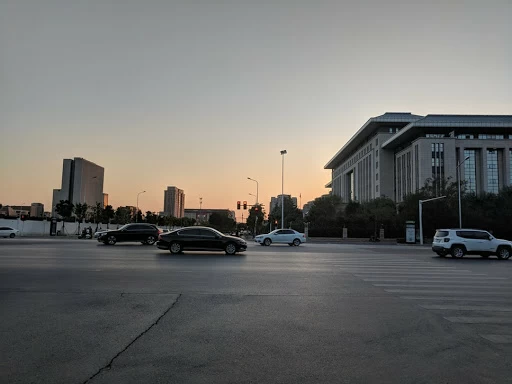 Large parking lot outside a public building