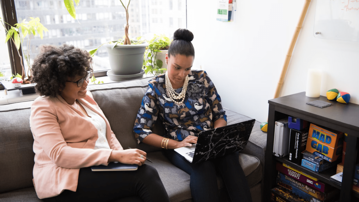 employees meeting in private consulting booth