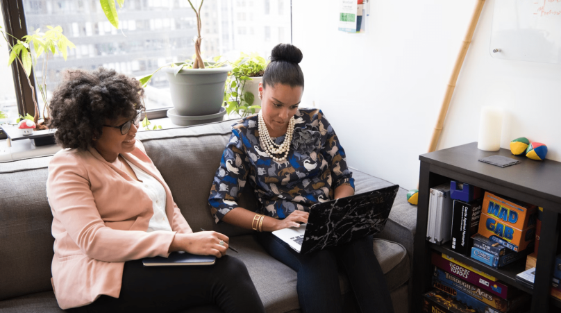 employees meeting in private consulting booth