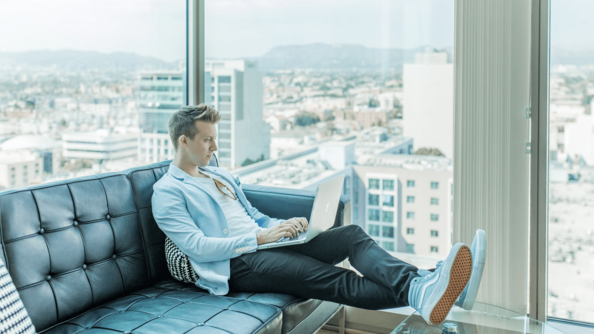 employee in mobile consulting station working on laptop