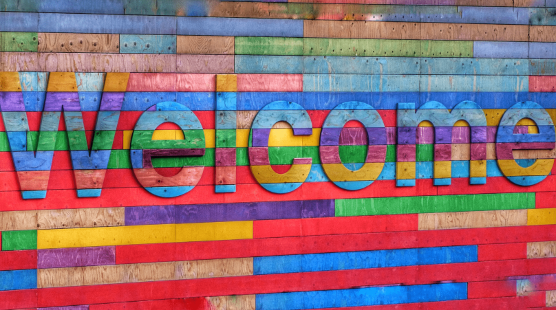 welcome sign on welcome booths for holiday shopping