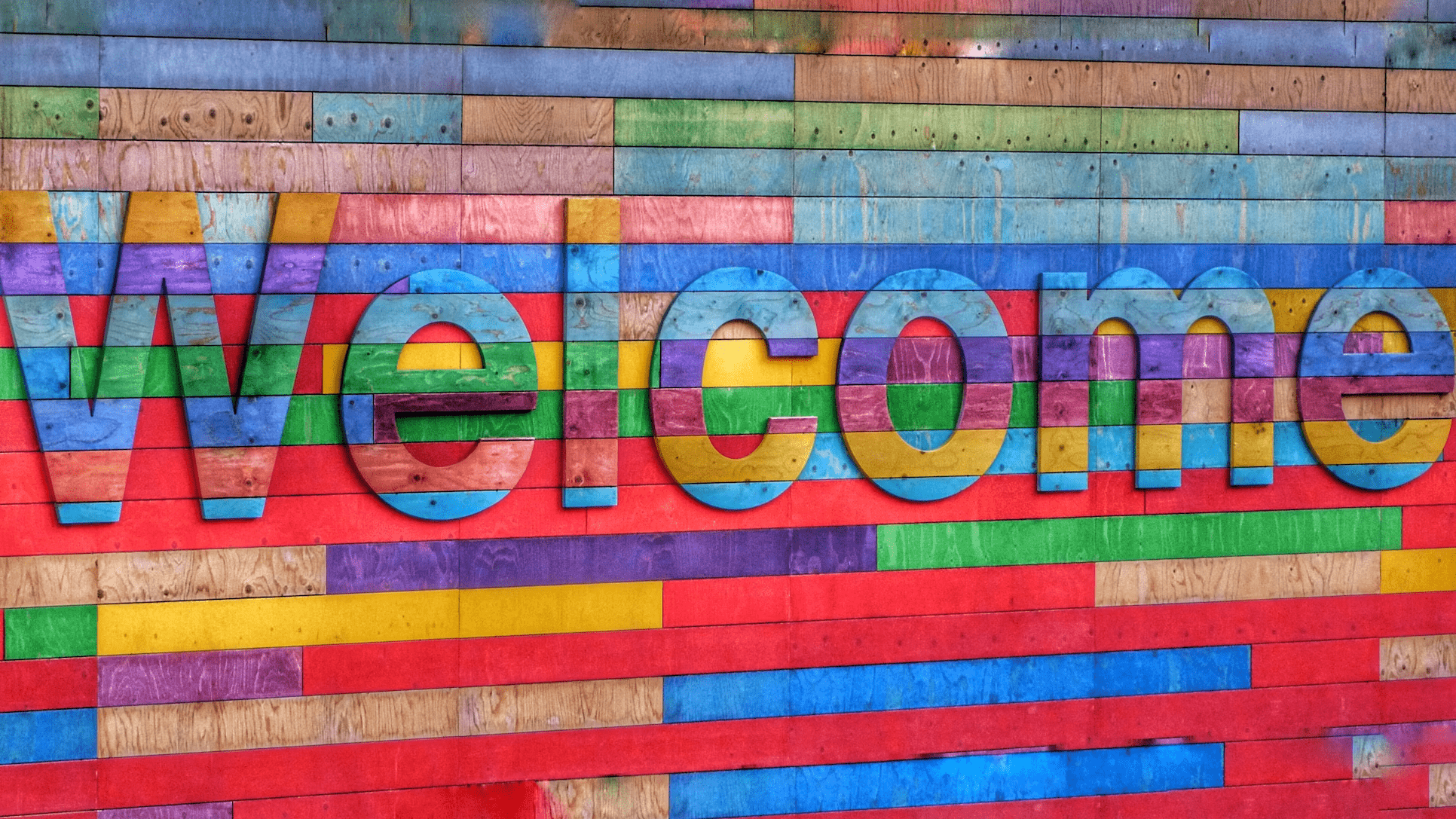 welcome sign on welcome booths for holiday shopping